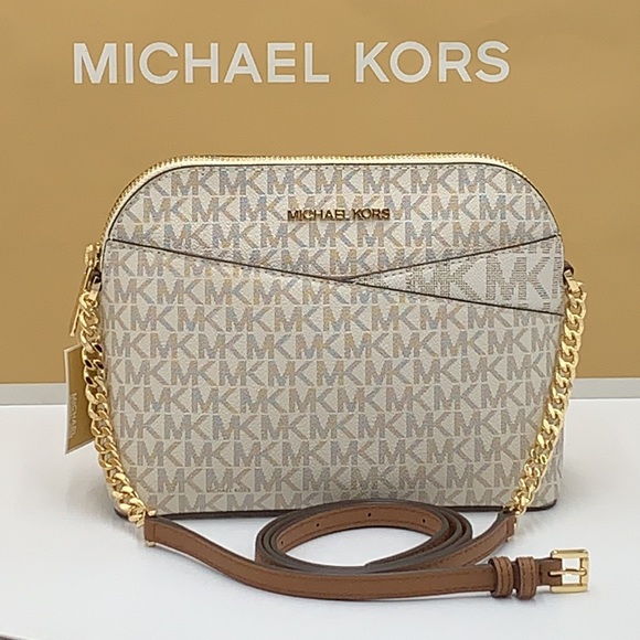 Michael Kors Medium Dome Xcross Xbody Bag
Color: Vanilla Multi - Picture 2 of 16